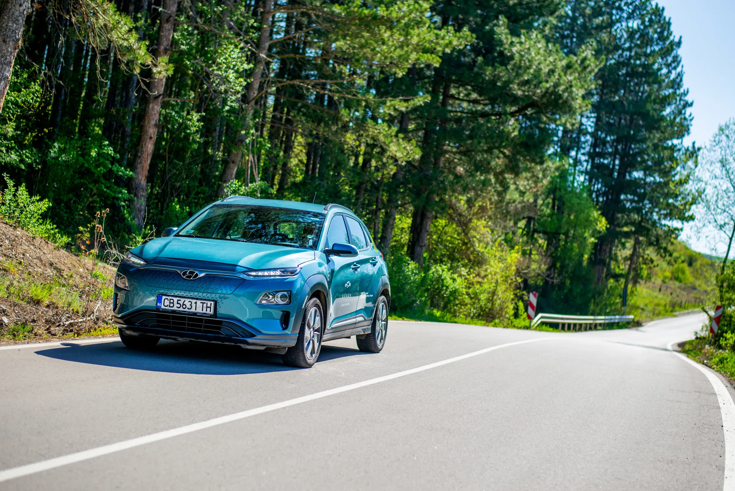 SPARK electric Kona on a forest road